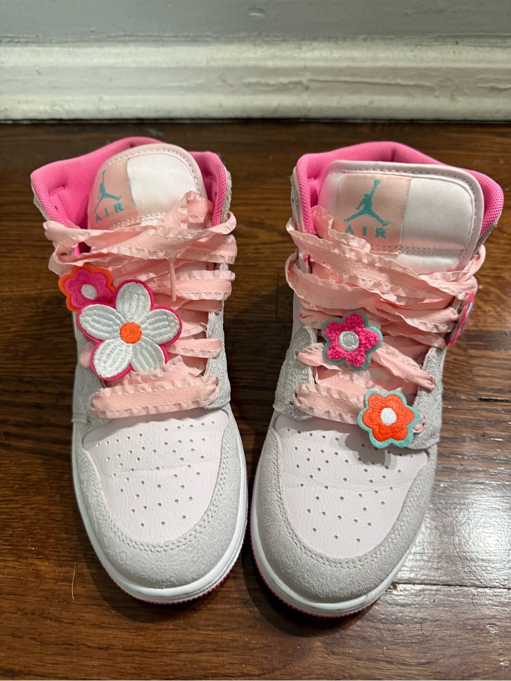 Kids Pink Floral High-Top Nike Jordan Sneakers